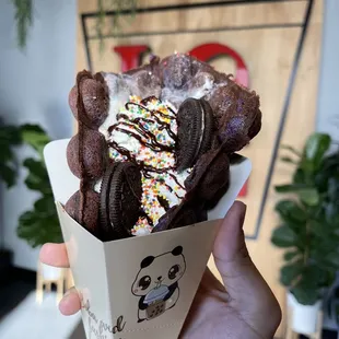 Ube bubble waffle with oreos and whipped cream
