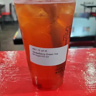 a drink in a plastic cup