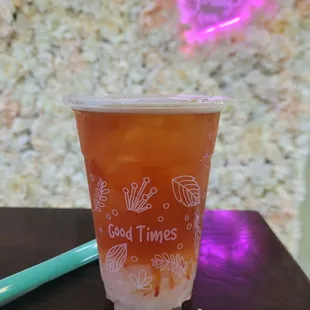 top fruit tea with coconut jelly (50% sugar, 50% ice)