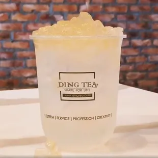 a drink in a plastic cup