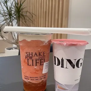 Strawberry slush with boba and cheese cream on the left. Strawberry yukult/ yogurt with boba on the right.