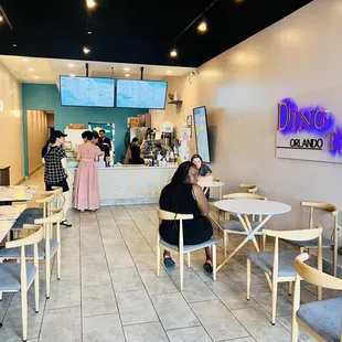 a woman sitting at a table