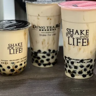 (Left to right): Hokkaido Black Milk Tea with monster boba (Regular), and two Hazelnut Milk Teas with double monster boba (Large)