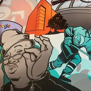 a mural of a hockey player and a robot