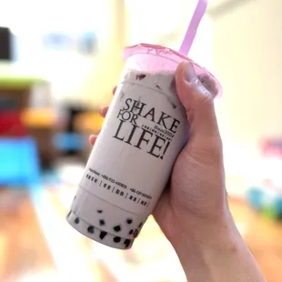 Taro milk tea with boba. Less ice and no sugar added. Delicious