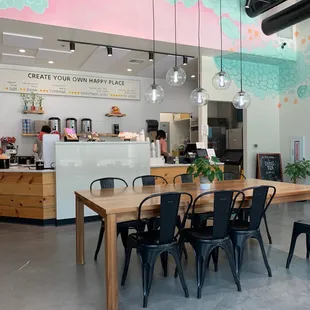 View of main counter and seating inside the shop.