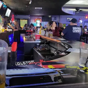 people sitting at the bar