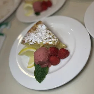 Gluten free Italian Almond-Lemon cake with raspberry sorbet and fresh raspberries