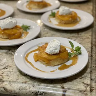 Peach upside down cake with a drizzle of warm cinnamon, bourbon, and honey sauce