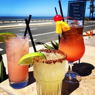 Some crafty Signature cocktails! left to right Partida Pom Paloma, Pineapple-jalapeño House Infused Margarita, Dini&apos;s Mai Tai. Yum!