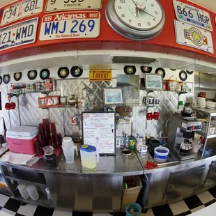 a clock on the wall above the counter