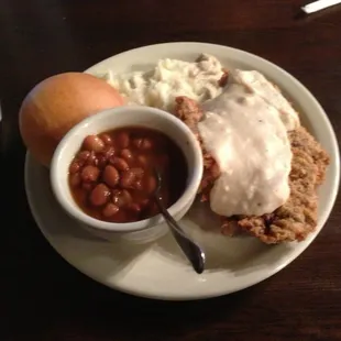 Chicken fried steak ,mashed potatoes ,red beans