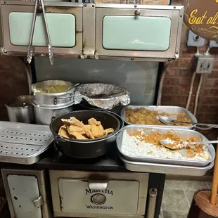 The old stove is filled with deliciousnesses