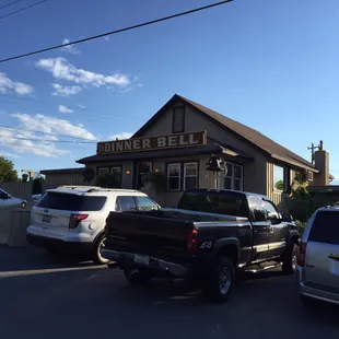 cars parked in front of the restaurant