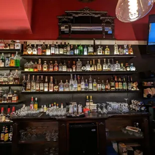 a bar full of alcohol bottles
