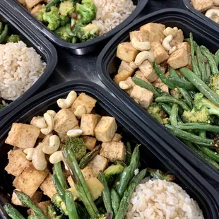 a variety of food in plastic containers