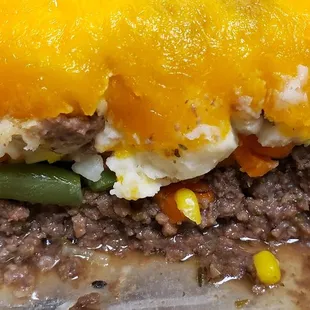 a closeup of a meat and vegetable casserole