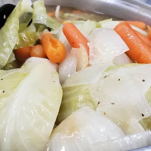 carrots and cabbage in a pot