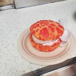 a pizza sandwich on a plate