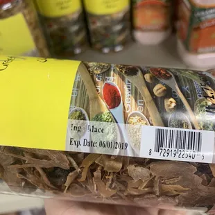 a hand holding a bag of food