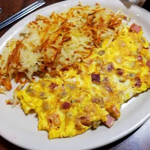 Country omelette with hash browns and sour dough toast