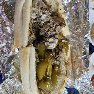 Philly steak without the salad toppings. Grilled peppers and onion only