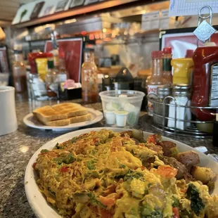 All Veggie Omelette with potatoes and sourdough bread.