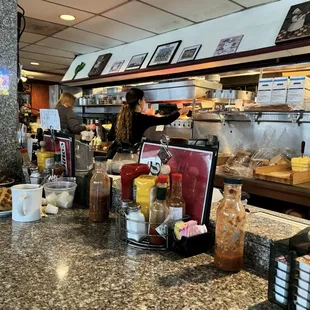 Employees serving the hot food hot!