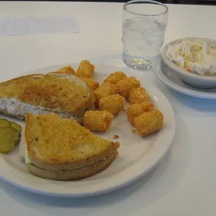 Tuna sandwich with dynamite potato tots. I mean, where can you find those anymore except at Dino&apos;s.