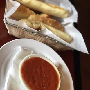 Breadsticks and tomato sauce dip
