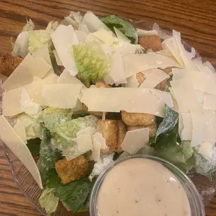 Cesar salad with dressing on the side