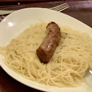 Garlic oil angel hair pasta with sausage.  Presentation could use some work:(