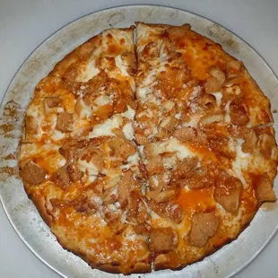 a pizza with cheese and sausage