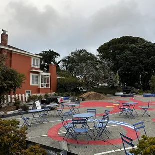 tables and chairs in a park