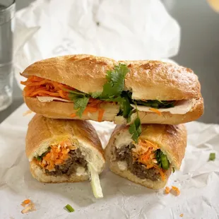 The Special: slow roasted pork, fancy pork loaf, and pork pate sitting atop the Shaking Beef, sandwiched in a warm, crusty French baguette.