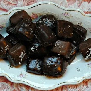a plate of chocolate candies