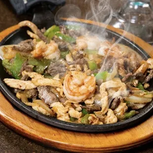 a steaming dish of food