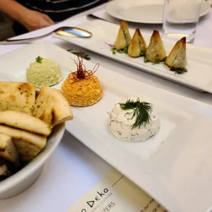 Pita, tzatziki, and spanakopita