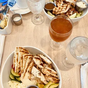 a meal of grilled chicken and vegetables