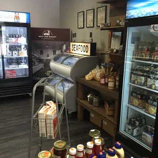 Cold cases with beer, meat, and seafood.