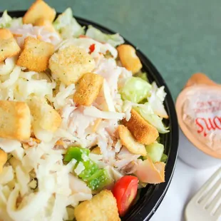 Turkey salad with iceberg lettuce, turkey, provolone, tomatoes, croutons &amp; Dion's mix.