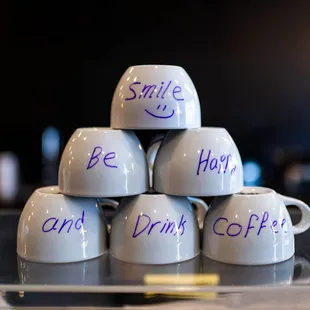 a stack of coffee mugs