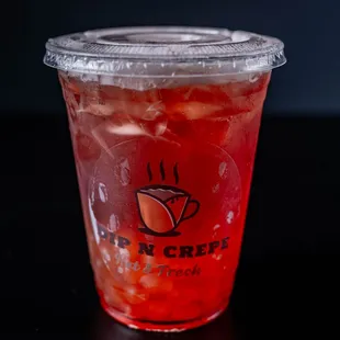 a drink in a plastic cup