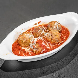 Italian meatballs served with homemade marinara sauce