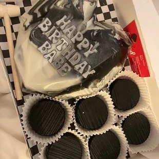 a cake in a box with chocolates