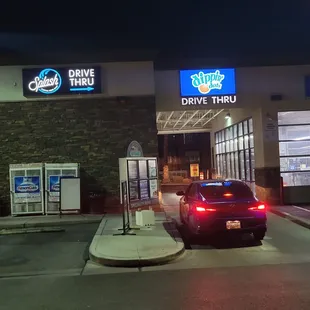  car parked in front of a drive thru