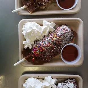 Each Sweet Dipstick Waffle is served with a side of cream and a side of syrup