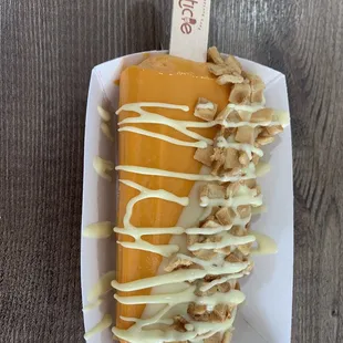 Thai tea dipped in white chocolate with waffle cone