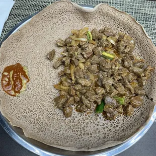 Beef Wat with fresh beriberi (Ethiopian hot sauce made from cayenne pepper and other spices).