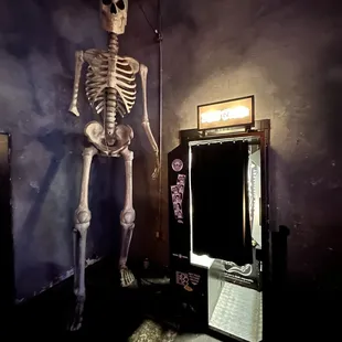 a skeleton and a vending machine